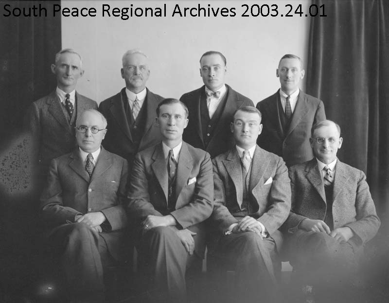 Town councillors, Secretary-Treasurer Keyes, and Mayor P.J.Tooley (1934)